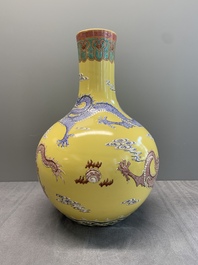 A Chinese famille rose yellow-ground 'dragon' 'tianqiu ping' vase, 20th C.
