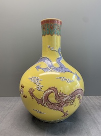 A Chinese famille rose yellow-ground 'dragon' 'tianqiu ping' vase, 20th C.