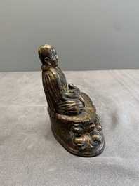 A Tibetan bronze Padmasambhava, 14th C.