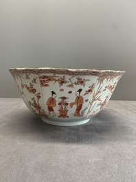 A Chinese iron-red and gilt-decorated 'ladies in a garden' bowl, Kangxi