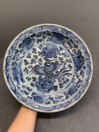 A Chinese blue and white 'phoenix and peonies' dish, Hongzhi/Zhengde