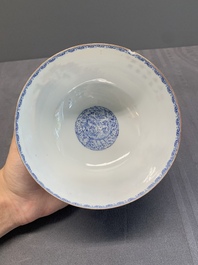 A pair of Chinese famille rose eggshell bowls with floral design, Qianlong mark, 20th C.