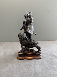 A rare Chinese bronze incense burner and cover in the shape of Liu Hai and a three legged toad, Ming