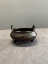 A Chinese bronze tripod censer, Xuande mark, 17/18th C.