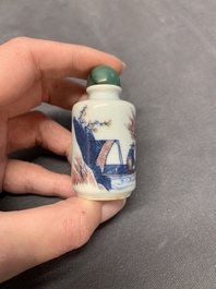 A Chinese blue, white and copper-red 'fisherman' snuff bottle, Qing Yang Dao Ren 卿陽道人 mark, 19th C.