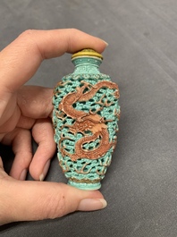 A Chinese moulded turquoise-ground famille rose 'dragon and phoenix' snuff bottle, 19th C.