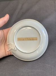 A fine Chinese famille rose armorial cup and two saucers, Yongzheng/Qianlong
