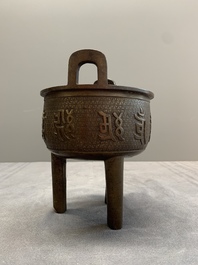 A Chinese bronze covered censer and a tripod censer, Ming/Qing