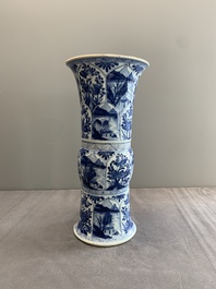 Two Chinese blue and white 'gu' vases with landscape and floral panels, Kangxi