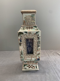An extremely rare Chinese blue, white and famille verte openworked double-walled vase with figural design, 19th C.
