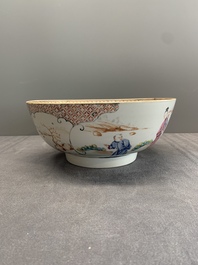 A Chinese Canton famille rose bowl with figures in a garden, Qianlong