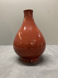 A Chinese copper-red-glazed pear-shaped vase, Yongzheng mark and of the period