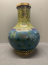A pair of large Chinese cloisonn&eacute; 'magpies among flowering branches' vases, 19th C.