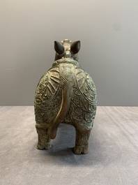 A rare Chinese inscribed bronze tapir-form vessel and cover, 'xizun 犧尊', late Ming/early Qing