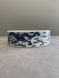 A Chinese blue and white 'dragon and phoenix' brush washer, Yongzheng mark, 19th C.