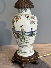A Chinese famille verte vase mounted as lamp and a famille rose covered tureen, 19th C.