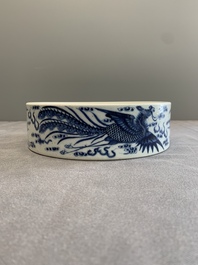 A Chinese blue and white 'dragon and phoenix' brush washer, Yongzheng mark, 19th C.