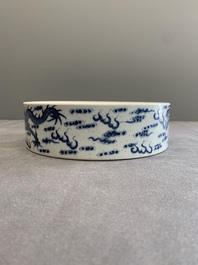 A Chinese blue and white 'dragon and phoenix' brush washer, Yongzheng mark, 19th C.