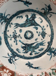 Two Chinese Swatow red-, turquoise- and black-enamelled 'phoenixes' and 'river landscape' dishes, Ming