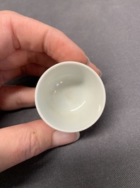 A small Chinese blue, white and copper-red 'dragon' wine cup, Lang Jin Ge Zhi 郎唫閣製 mark, 19/20th C.