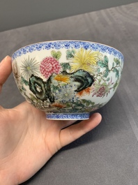 A pair of Chinese famille rose eggshell bowls with floral design, Qianlong mark, 20th C.