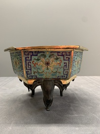 A pair of Chinese cloisonn&eacute; 'lotus and elephant' jardini&egrave;res, 18/19th C.