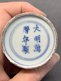 Seven Chinese blue, white and doucai vases, Wanli/Yongzheng/Qianlong mark, 19th C.