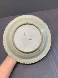 A Chinese blue and white 'phoenix' dish and two 'Buddhist lion' and 'peony' plates, Hongzhi/Zhengde