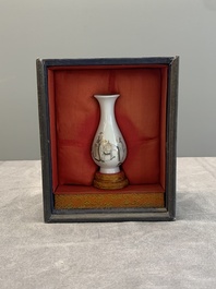 A Chinese grisaille 'Taoist' vase and a fitted box, Yongzheng mark and of the period