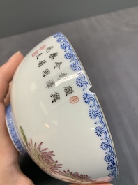 A pair of Chinese famille rose eggshell bowls with floral design, Qianlong mark, 20th C.