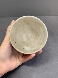 A Chinese black-glazed reverse-decorated 'poem' brush pot, 19th C.
