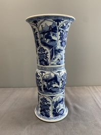 Two Chinese blue and white 'gu' vases with landscape and floral panels, Kangxi
