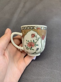 A fine Chinese famille rose armorial cup and two saucers, Yongzheng/Qianlong