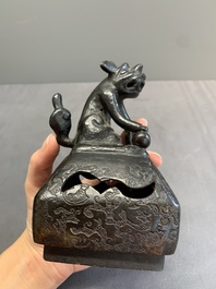 A Chinese bronze covered censer and a tripod censer, Ming/Qing