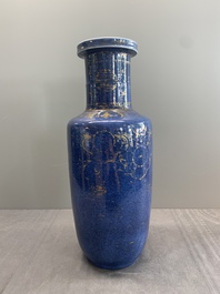 A Chinese gilt-decorated powder blue 'dragon and phoenix' rouleau vase, Kangxi