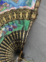 Two Chinese Canton gilt-lacquered and painted paper fans, one with original box, 19th C.