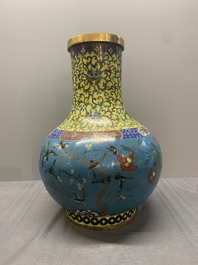 A pair of large Chinese cloisonn&eacute; 'magpies among flowering branches' vases, 19th C.