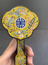 A Chinese Beijing enamel yellow-ground 'bajixiang' ruyi sceptre, Qianlong mark, 19/20th C.