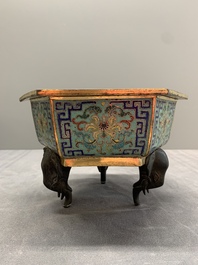 A pair of Chinese cloisonn&eacute; 'lotus and elephant' jardini&egrave;res, 18/19th C.