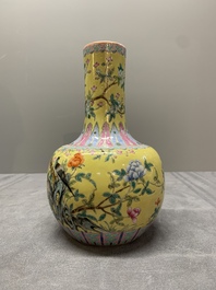 A Chinese famille rose yellow-ground bottle vase, Bao Shan Zhai 寶善斎 mark, 19th C.