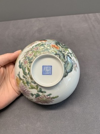 A pair of Chinese famille rose eggshell bowls with floral design, Qianlong mark, 20th C.