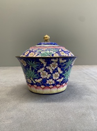 A pair of Chinese Canton enamel bowls and covers with floral design, Qianlong