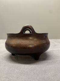 A Chinese bronze tripod censer, Xuande mark, Ming