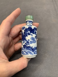 A Chinese blue and white 'dragon' snuff bottle and a polychrome 'peacock' snuff bottle, Yongzheng mark, 19/20th C.