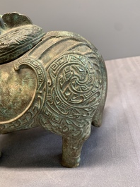 A rare Chinese inscribed bronze tapir-form vessel and cover, 'xizun 犧尊', late Ming/early Qing