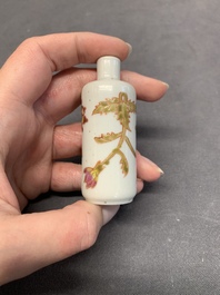 Three Chinese famille rose snuff bottles and two painted glass snuff bottles, Qianlong and Jujiutang mark, 19/20th C.