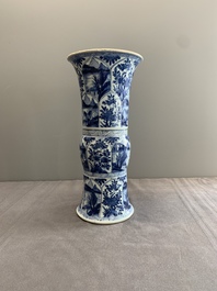 Two Chinese blue and white 'gu' vases with landscape and floral panels, Kangxi