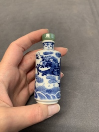 A Chinese blue and white 'dragon' snuff bottle and a polychrome 'peacock' snuff bottle, Yongzheng mark, 19/20th C.