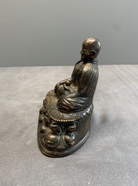 A Tibetan bronze Padmasambhava, 14th C.