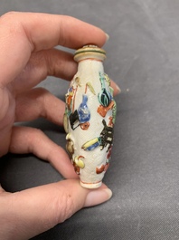 A Chinese molded famille rose 'antiquities' snuff bottle and porcelain stopper, Qianlong mark, 19th C.
